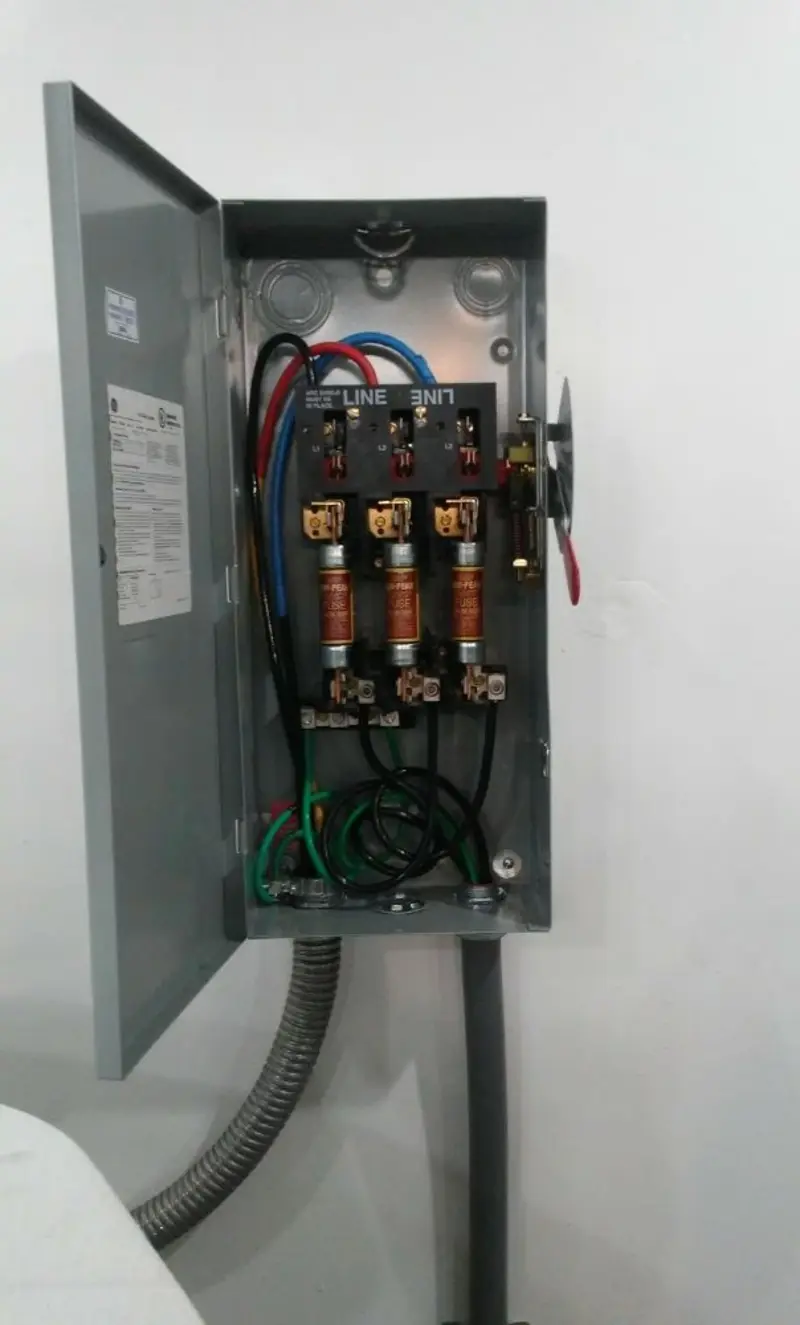 Three-phase disconnect switch installed for Smoke Detector Installation in McKean