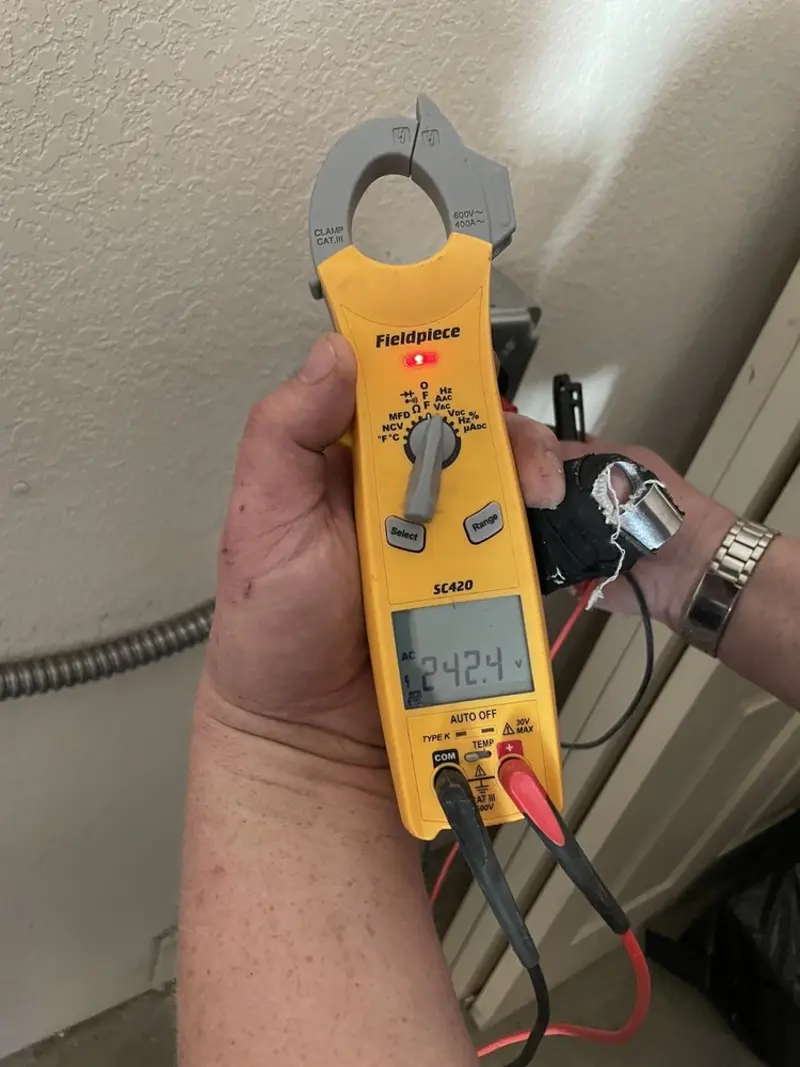 Voltage testing with clamp meter during Circuit Breaker Repair in McKean